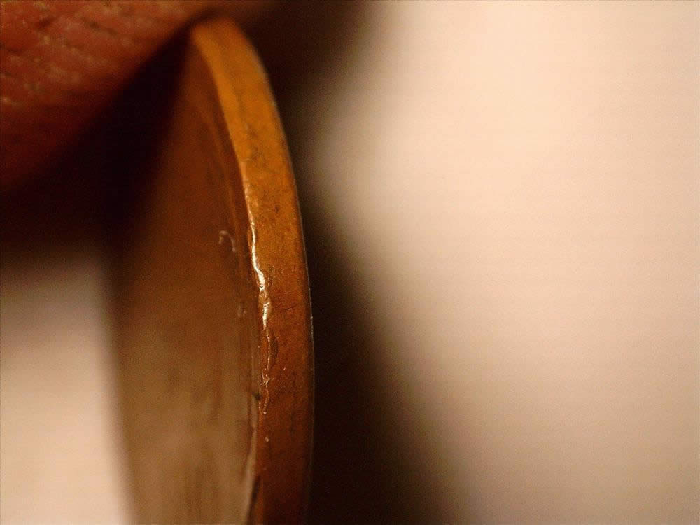 Help-With-A-1941-Cent-Struck-On-A-Foreign-Stock.