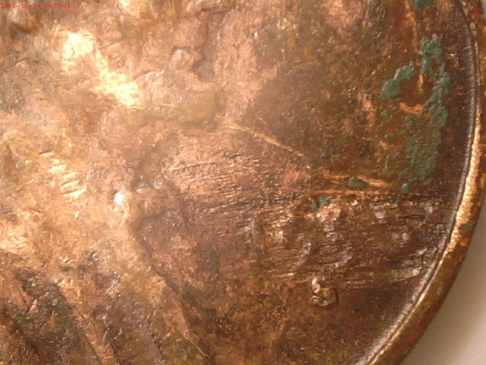 1957-Wheat-Penny--Peeled-Lamination?