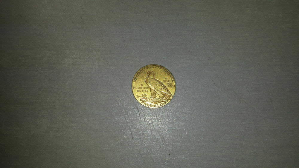 1915-P-5-Dollar-Gold-Piece-Can-You-Grade-It?