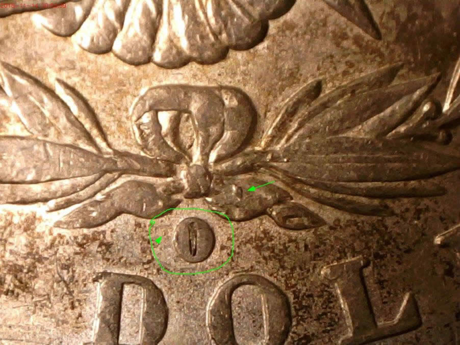 1884-O-Morgan-Line-On-Center-Of-O