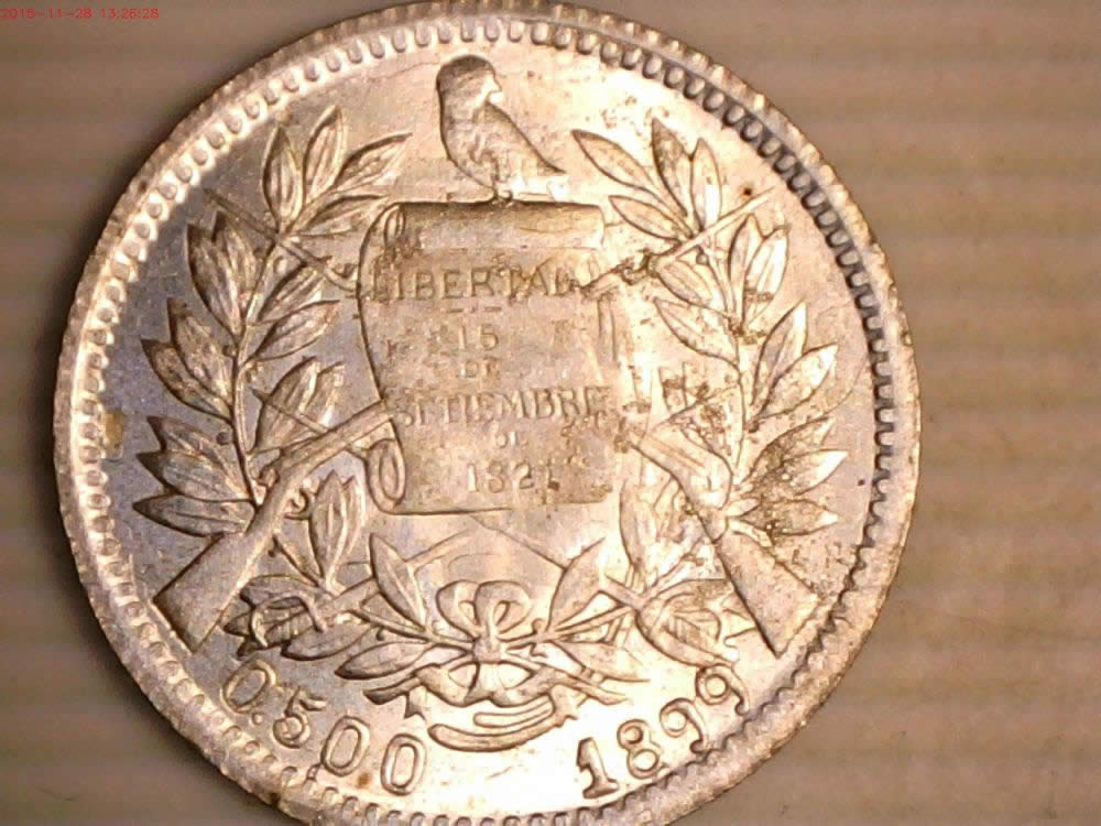 1899-Guatemala-1-Real-Obverse-Die-Clash---Reverse-Die-Cracks