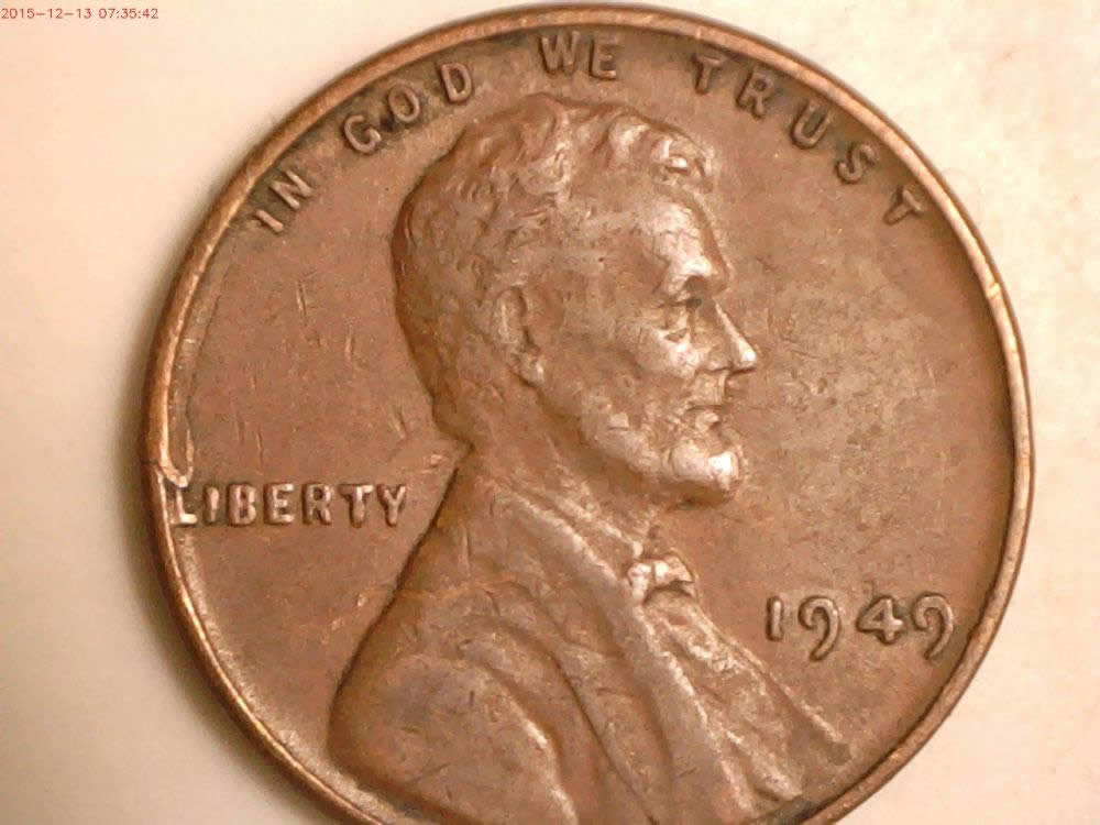 1949-Cent-,-Lamination-Or-Retained-Cud?