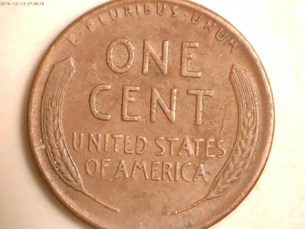 1949-Cent-,-Lamination-Or-Retained-Cud?