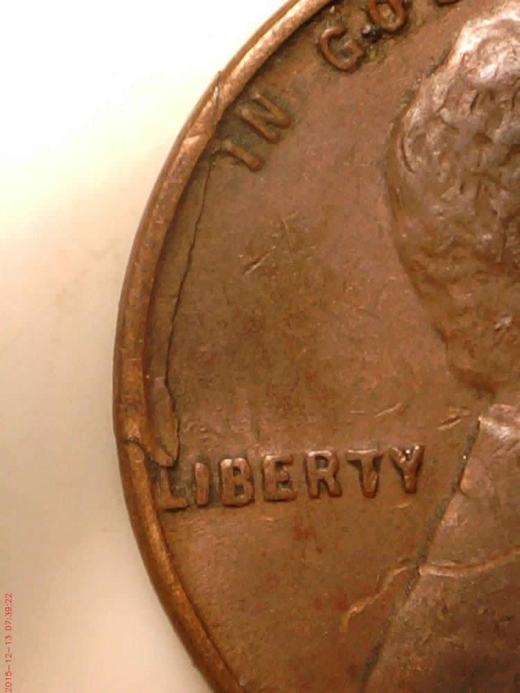 1949-Cent-,-Lamination-Or-Retained-Cud?