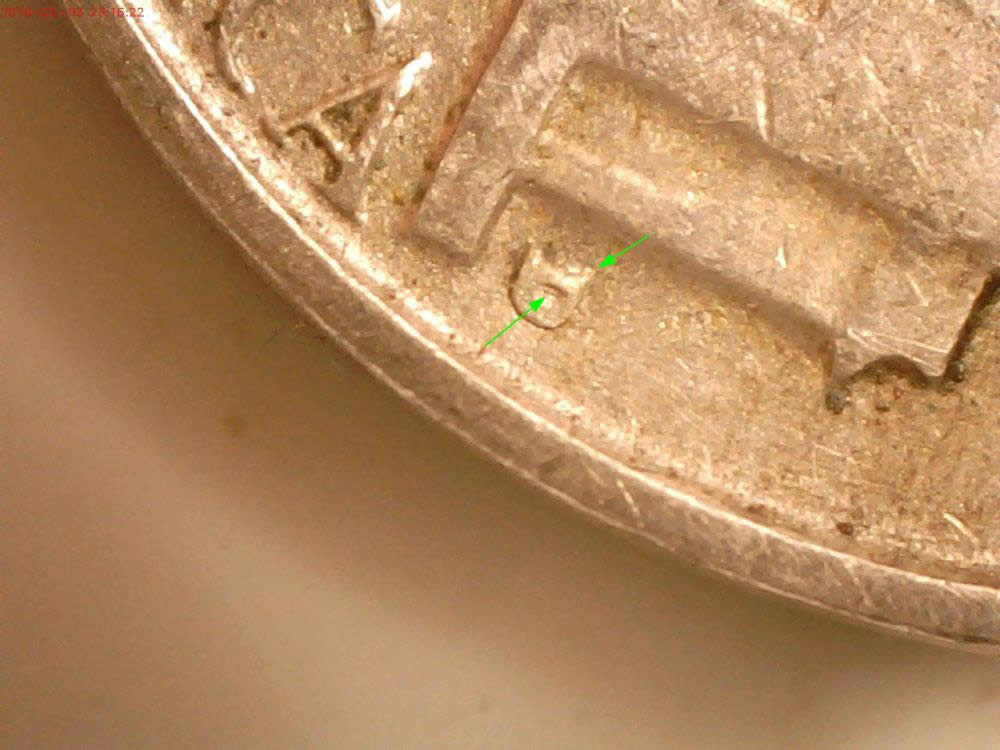 1952-D--RPM-With-Split-Serif-And--Bar-Inside-M/M