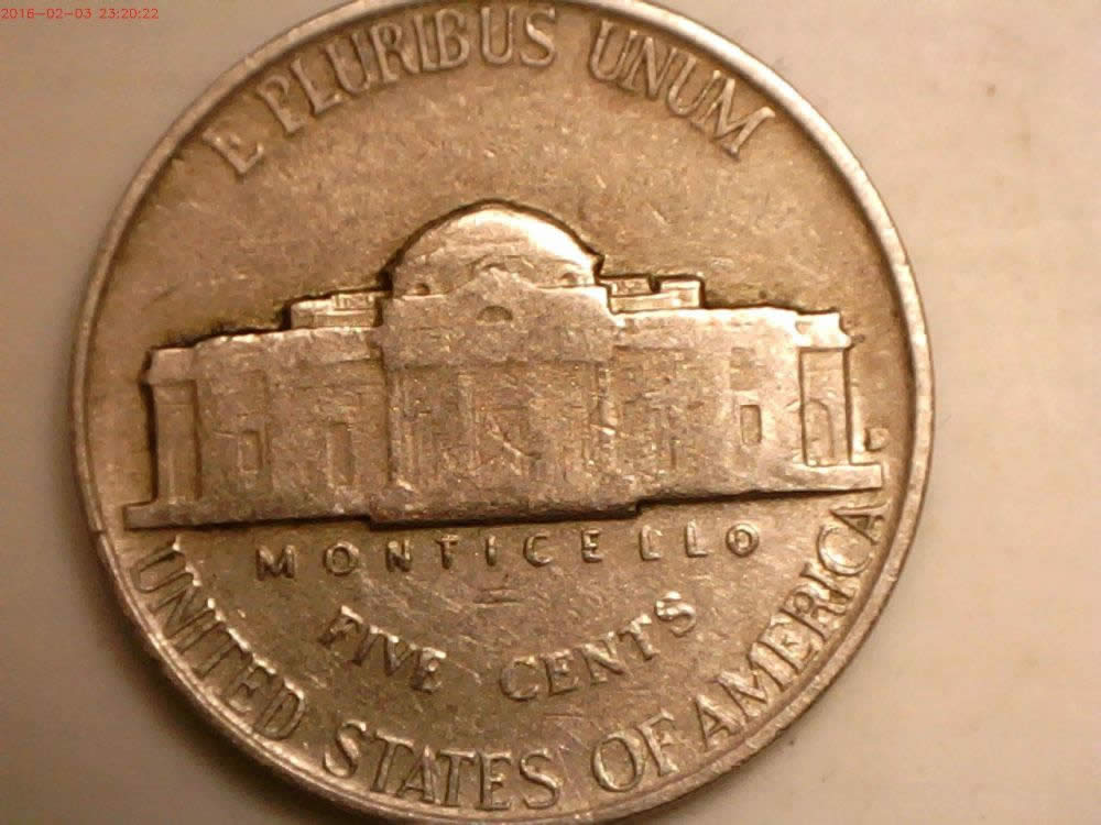 1952-D--RPM-With-Split-Serif-And--Bar-Inside-M/M