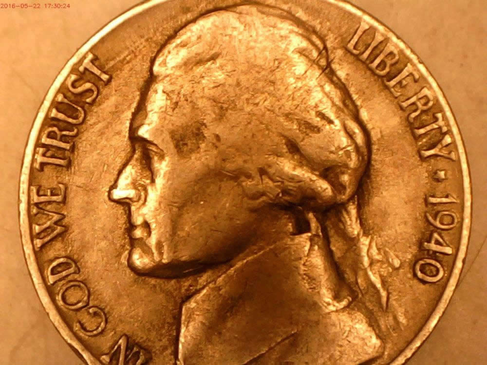 1940-S-Nickel-With-A-Chip-On-The-M/M-Or-Something-Else?