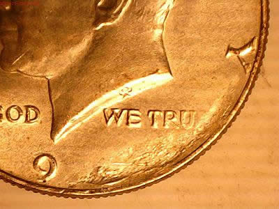 19xx-Half-Dollar-With-Struck-Through-Grease-?
