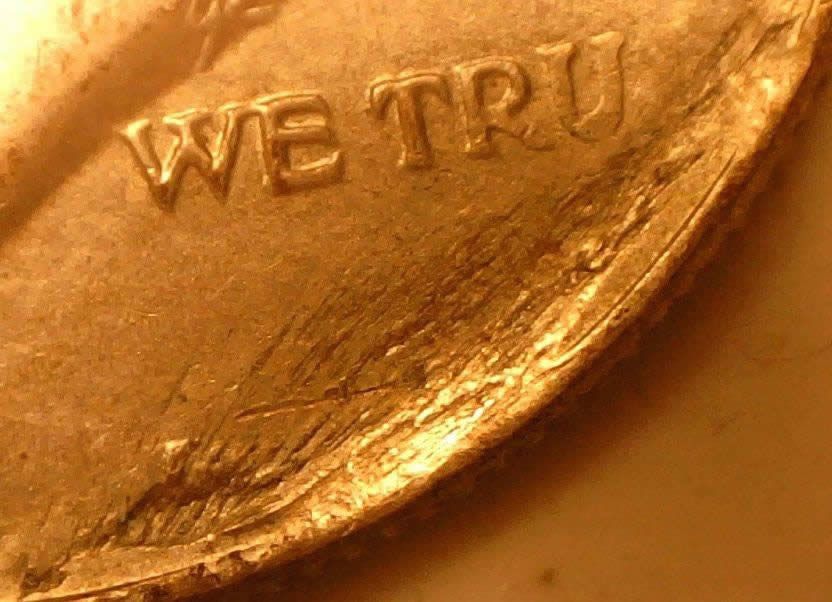 19xx-Half-Dollar-With-Struck-Through-Grease-?