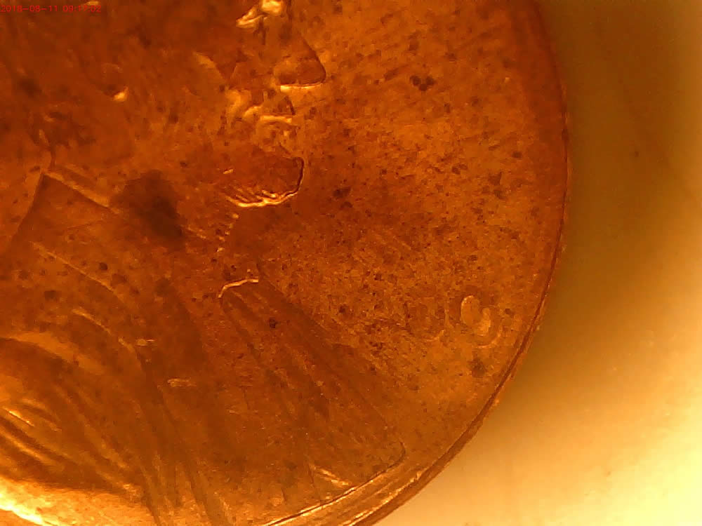 2000-Lincoln-Struck-Through-Grease-,-Just-Struck-Thru?