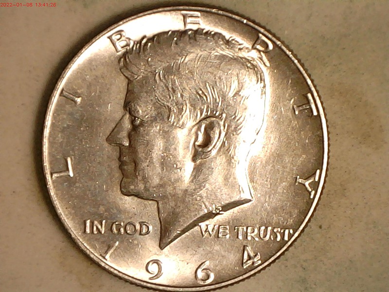1964--D-1/2-Dollar-,RPM-Or-A-Well-Place-Die-Chip-?