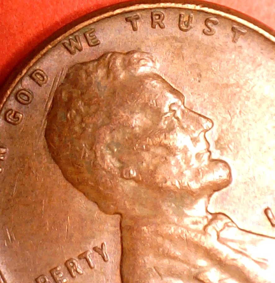1957-D-Obverse-Feeder-Fingers?