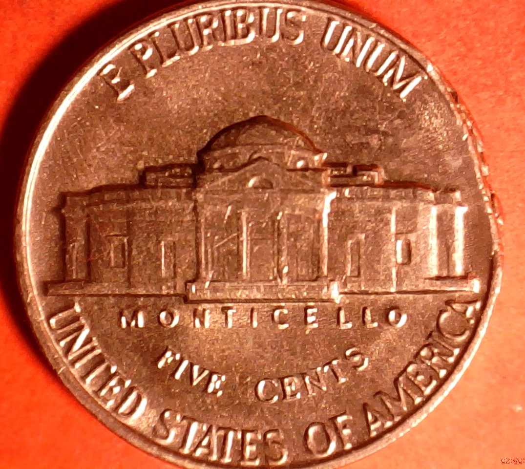 1963-Nickel-Struck-On-A-Defective-Planchet