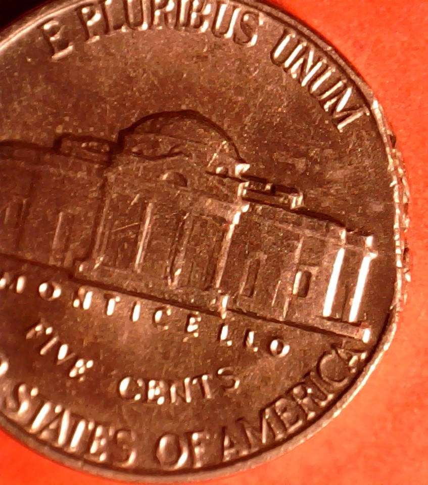 1963-Nickel-Struck-On-A-Defective-Planchet