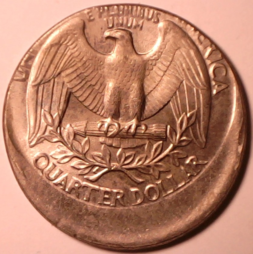 Quarter-No-Date1965-1988-From-Denver-Struck-25%-Off-Center.