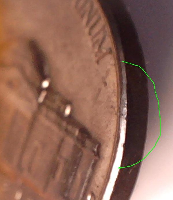 1964-D-Nickel-Reverse-Rim-Cud