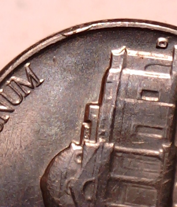 1964-D-Nickel-Reverse-Rim-Cud