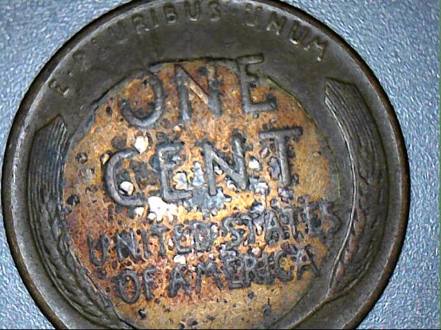 This-1956-Penny-Has-A-Raised-Circle-On-Back.-Any-Ideas-How-Or-Why?
