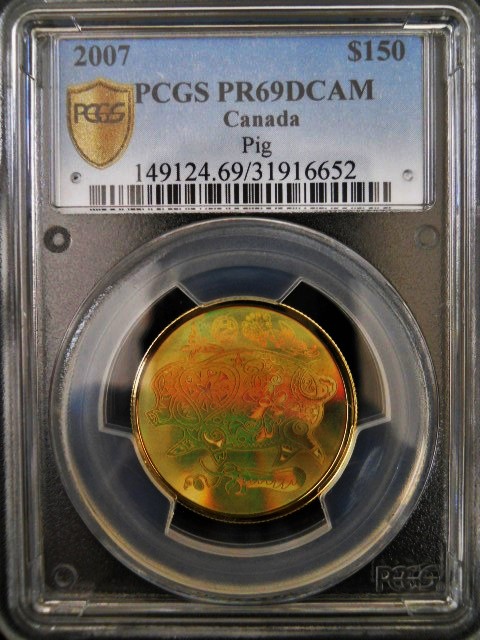 Holograph-Coins-Both-Snake-And-Pig