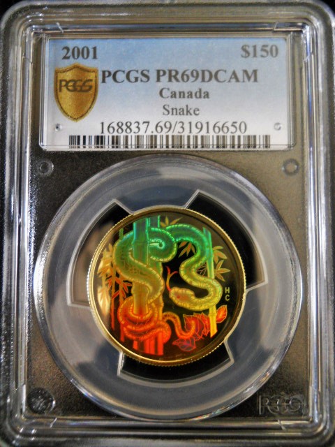 Holograph-Coins-Both-Snake-And-Pig