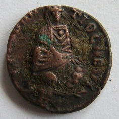 Bronze-Roman-Coin-With-Woman-On-Throne?
