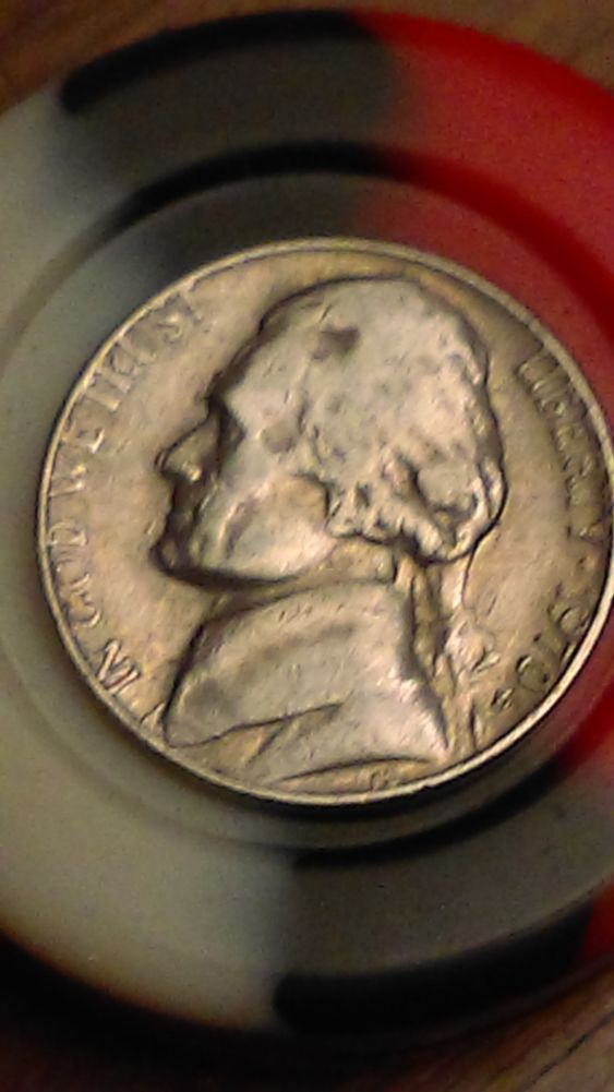 1970-S-Nickel-Error-On-Nose-And-Chin-And-Mint-Mark?