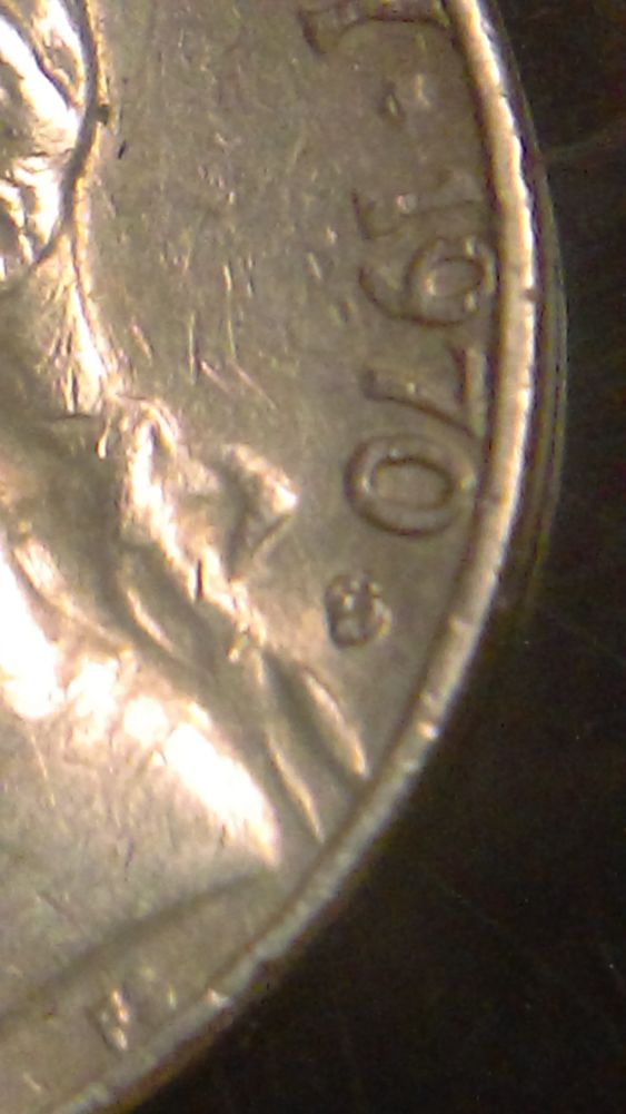 1970-S-Nickel-Error-On-Nose-And-Chin-And-Mint-Mark?