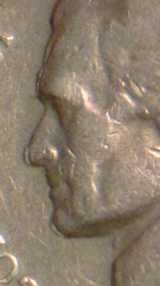 1970-S-Nickel-Error-On-Nose-And-Chin-And-Mint-Mark?