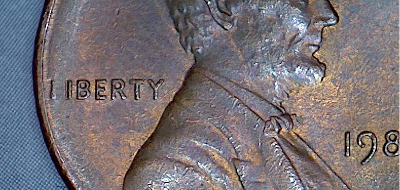 Lincoln-Penny-Missing-Part-Of-Letter-