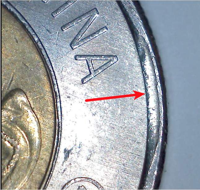 1996-2006-Toonie-With-Blob-On-Edge.