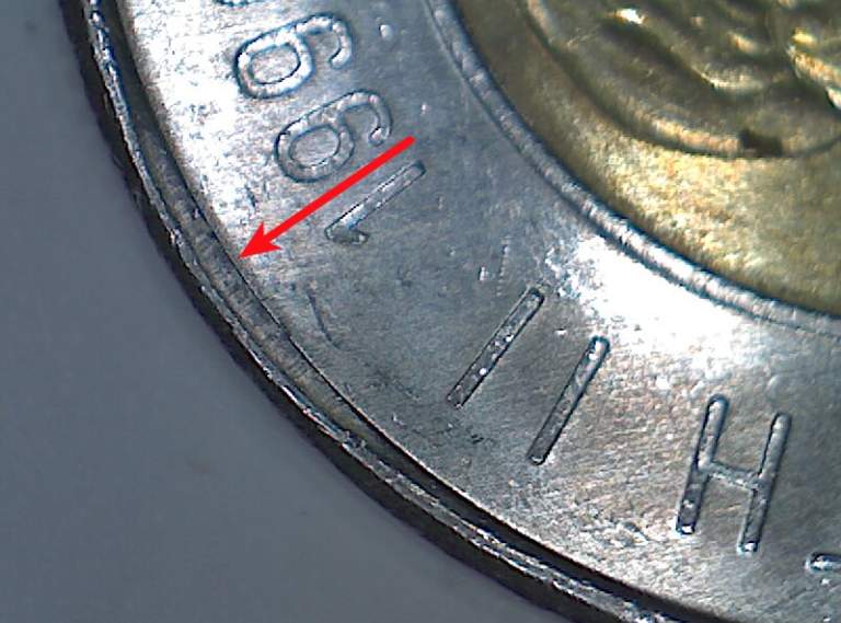 1996-2006-Toonie-With-Blob-On-Edge.