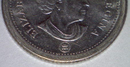 2008-Dime-With-Weird-Edge..?