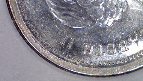 2008-Dime-With-Weird-Edge..?