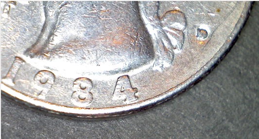 1984-Quarter---Punch-Mark-Sunken.