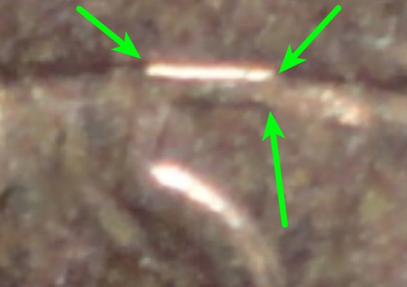2006-P-From-Mint-Roll---2-Deep-Scratches-Before-Strike?