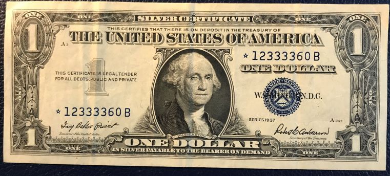 Does-The-Star-Denote-Replacement-?-1957-$1