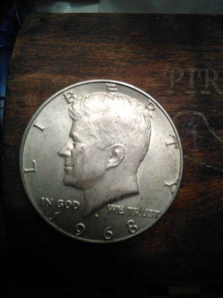 Does-A-Wood-Backround-Make-Silver-Coins-Look-Better?