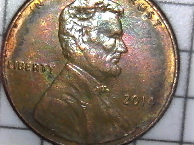 2014-Lincoln-Shield-Cent-That-Appears-To-Be-Struck-Through-Capped-Die?