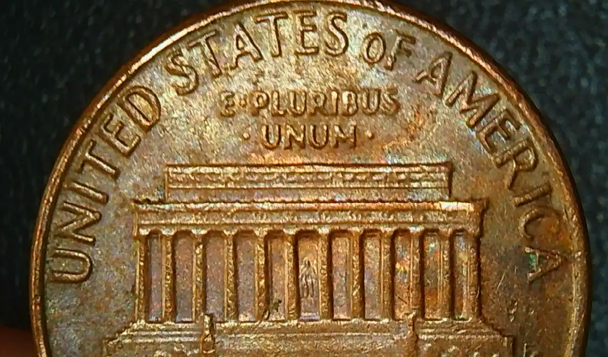 1976-P-LMC-Indent-Obverse-Error-Lincoln's-Face-Has-Part-Of-The-Memorial-From-The-Reverse.