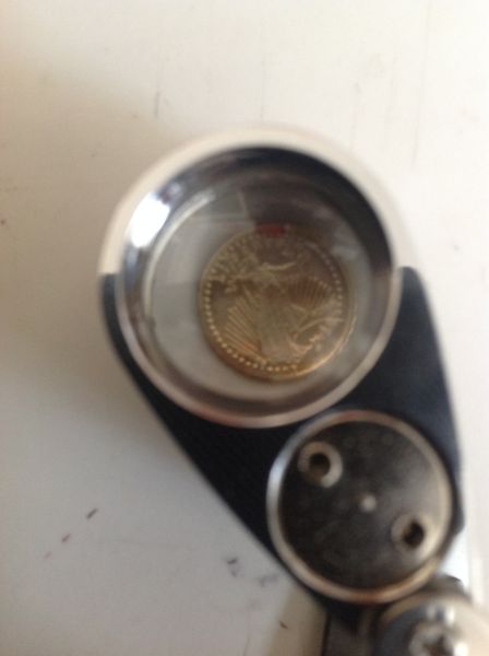 Gold-Ingot-In-The-Shape-Of-A-Coin?