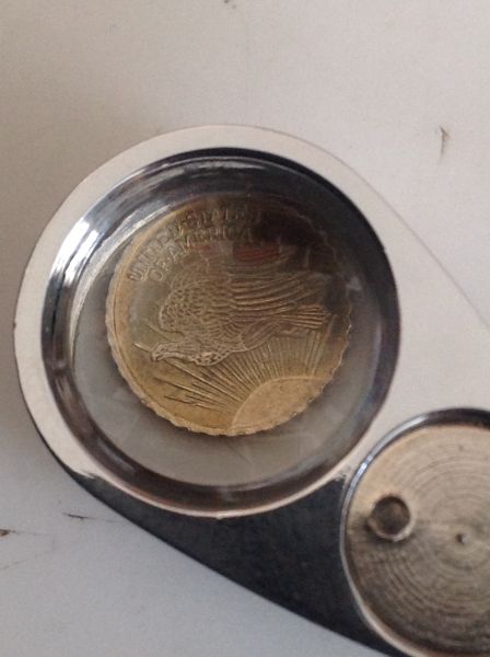 Gold-Ingot-In-The-Shape-Of-A-Coin?