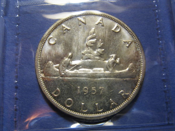 You-Vs-ICCS.....1957-Silver-Dollar