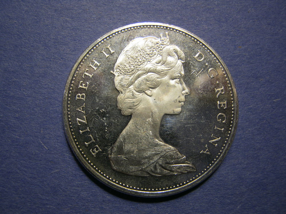 1965-Silver-Dollar...please-Grade.
