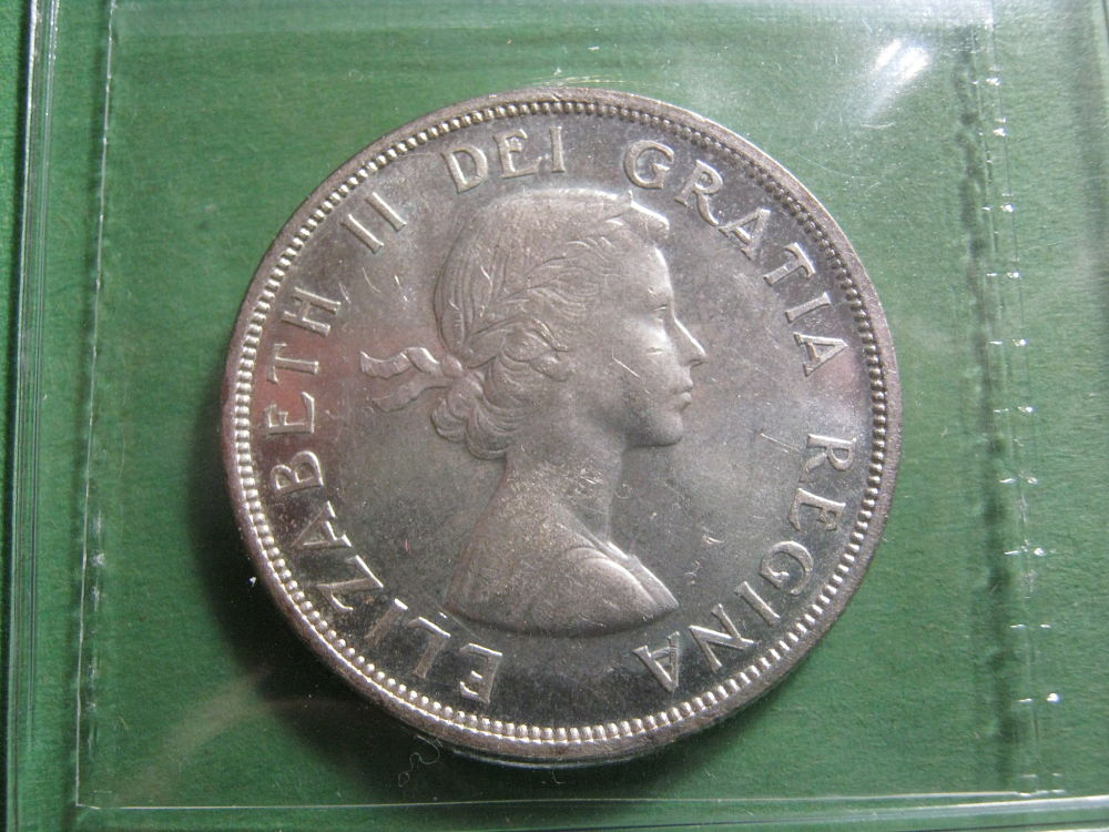 You-Vs.-ICCS....1956-Silver-Dollar