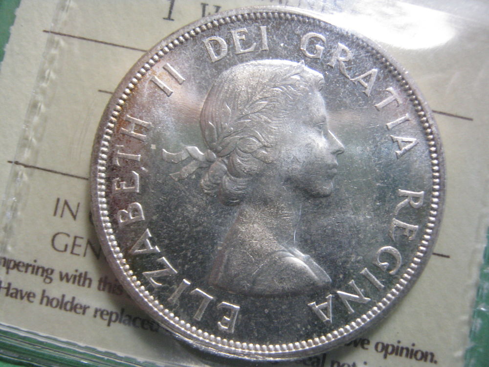 You-Vs.-ICCS....1957-Silver-Dollar