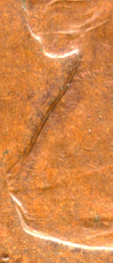Canadain-Cent-Doubling-On-Queen's-Back