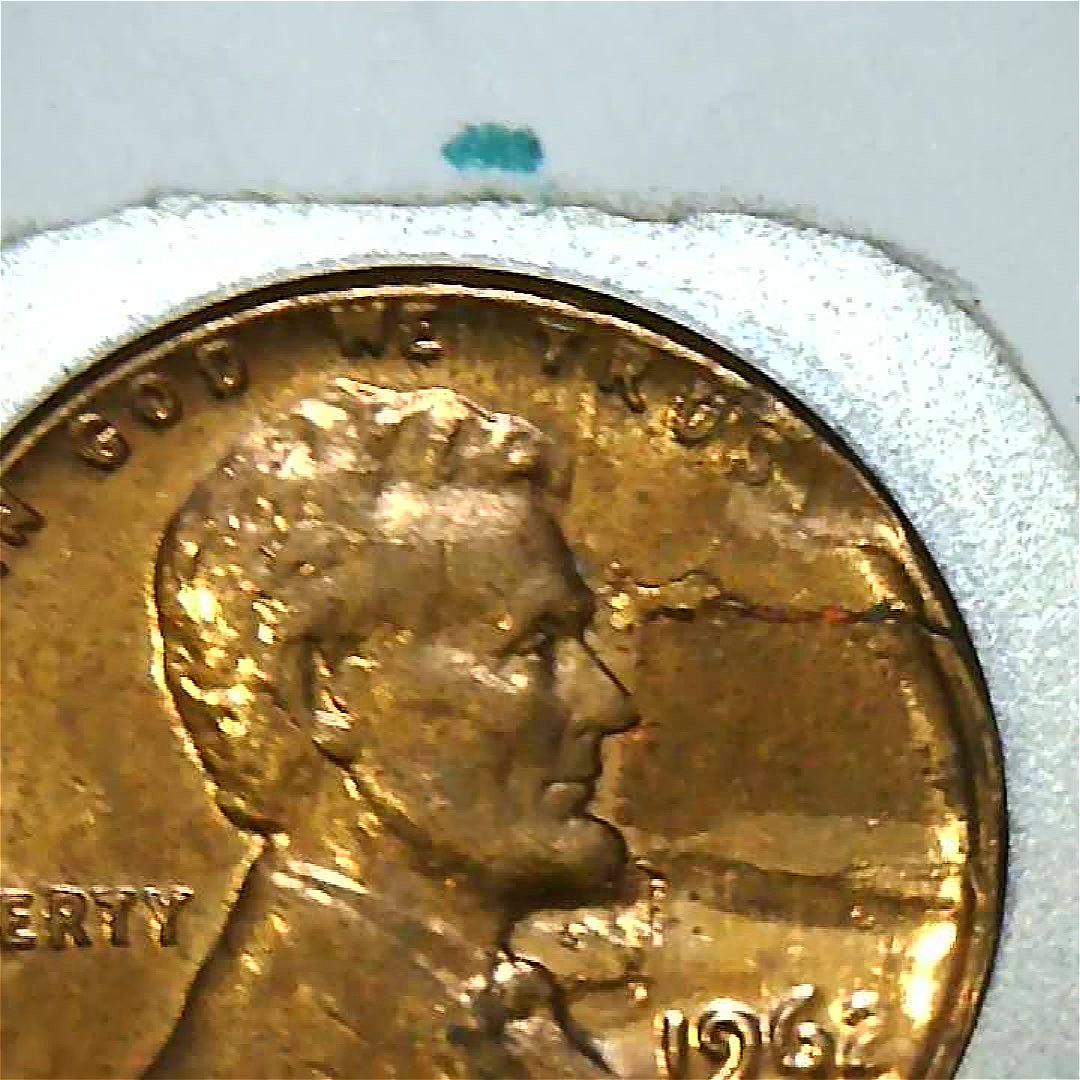 1962-Lincoln-Cent-With-Attached-Lamination-Error
