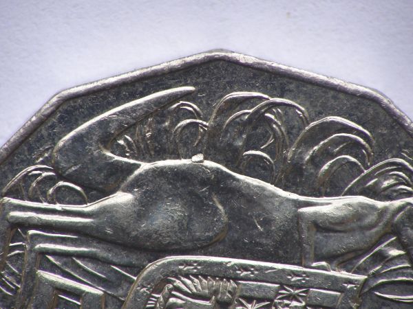 Same-Cud-Placement-On-2011-And-2010-Fifty-Cent-Coins