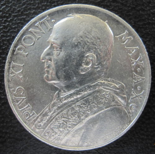 Studying-A-Coin-Of-Vatican-City-Pius-Xi