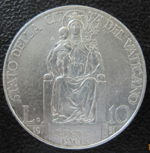 Studying-A-Coin-Of-Vatican-City-Pius-Xi